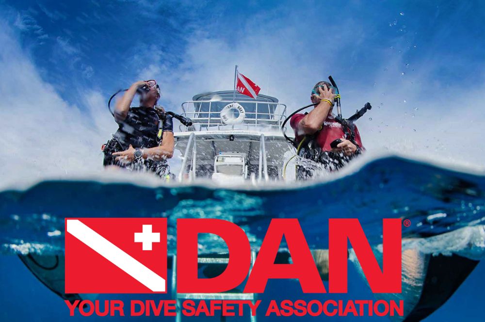 DAN logo and divers in the background