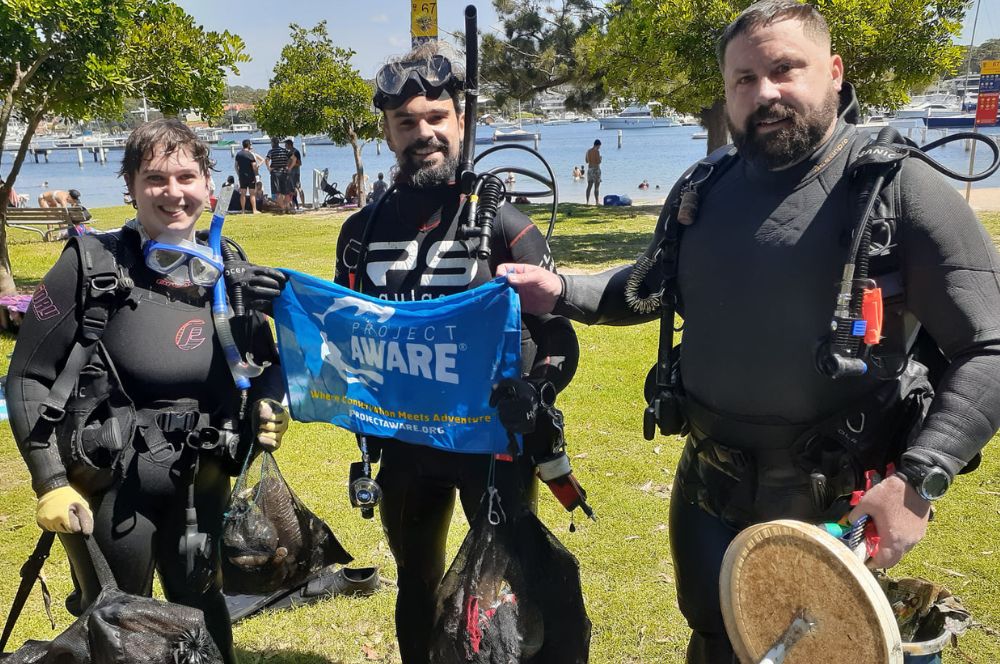 A diver involvedin a conservation effort with other local divers in Sydney, Australia