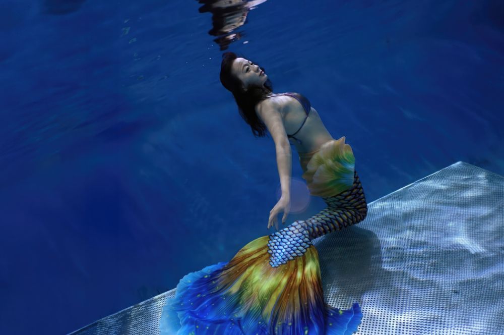 Mermaid in a swimming pool