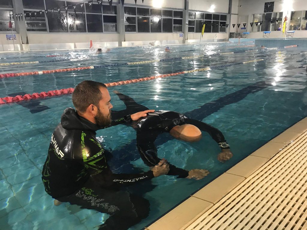 A PADI freediver instructor teaching Static Breathold during the Freediving Course