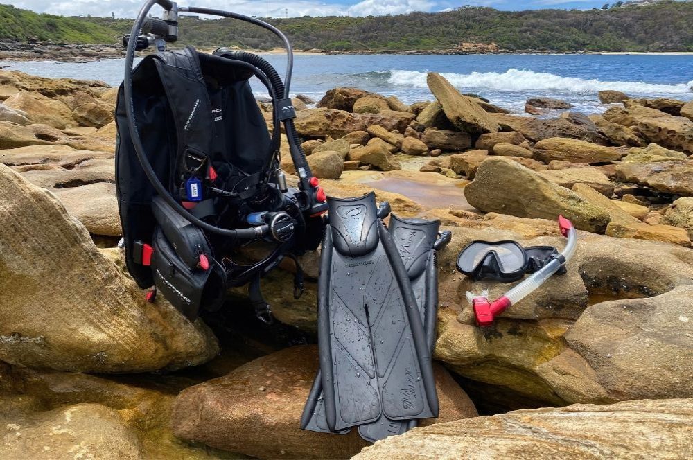 Dive kit with BCD, regulators, and fins