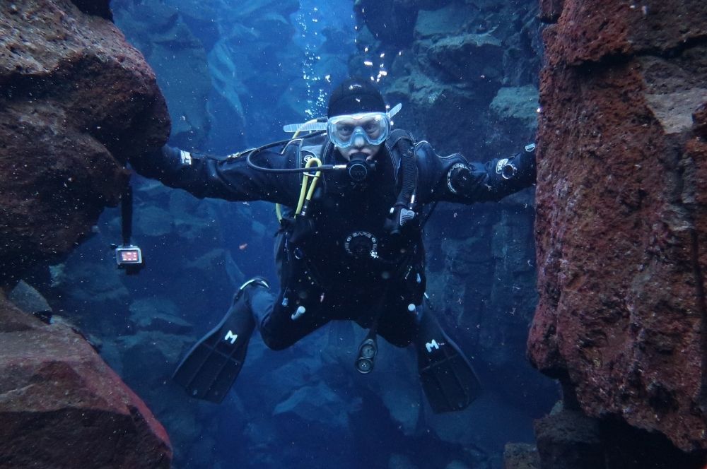 Diving  between the North American and Eurasian tectonic plates at Silfra in Iceland