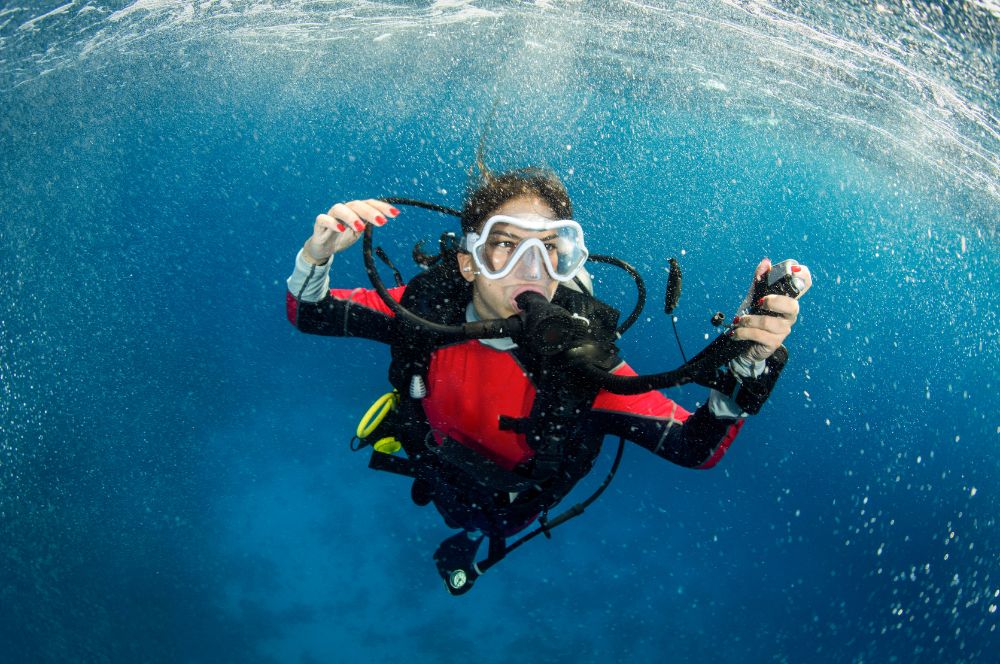 A diver ascending slowly from a dive