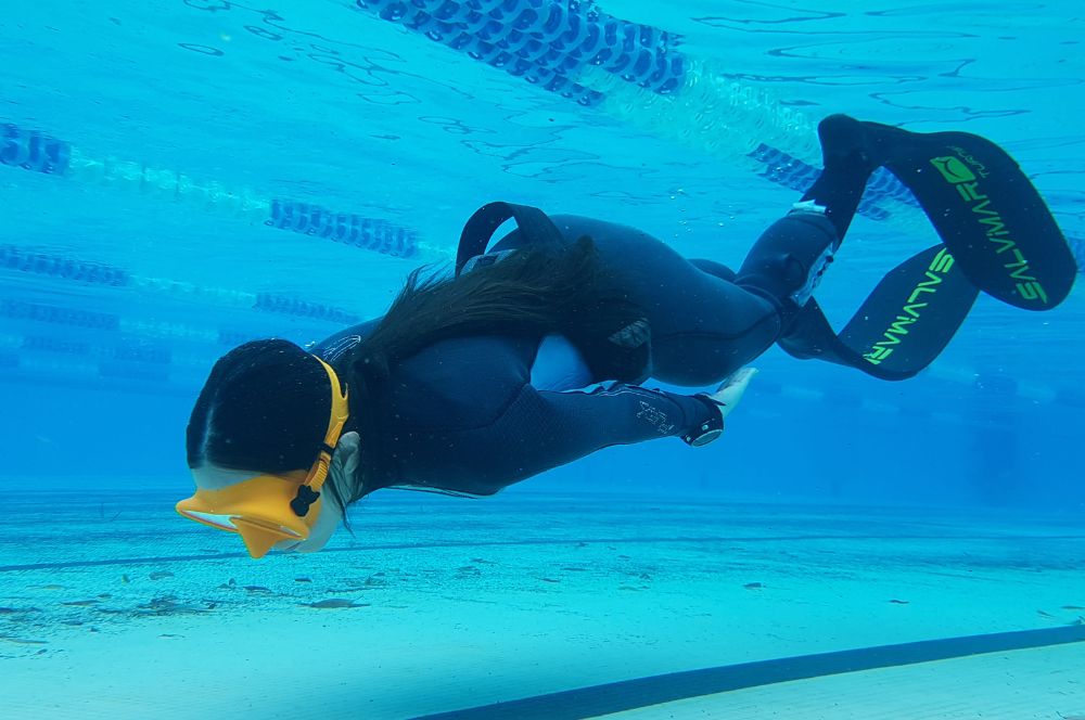 A person using freediving equipment