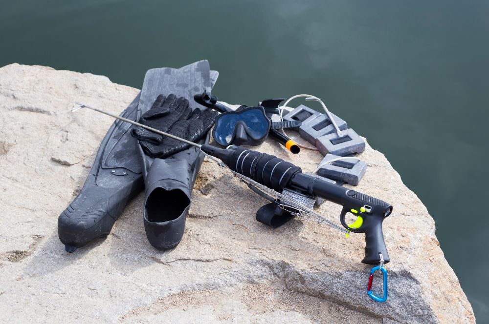 Apearfishing gear including spearguns, masks, and wetsuits